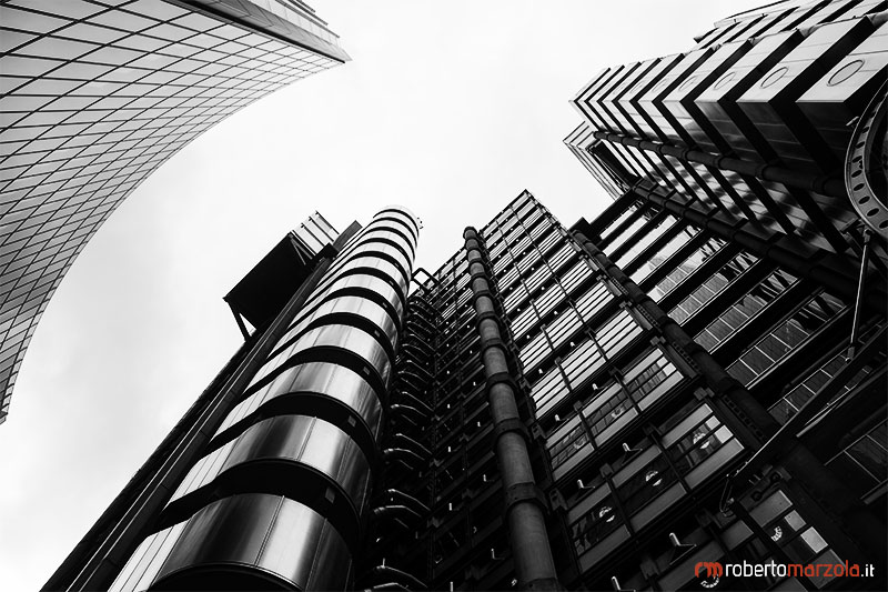 Lloyd's Building of London ,Glass City of London  England  london tower modern Office Block Reflection londra Built Structure Building Exterior Building Lloyd's Building Great Britain UK Low Angle View black and white